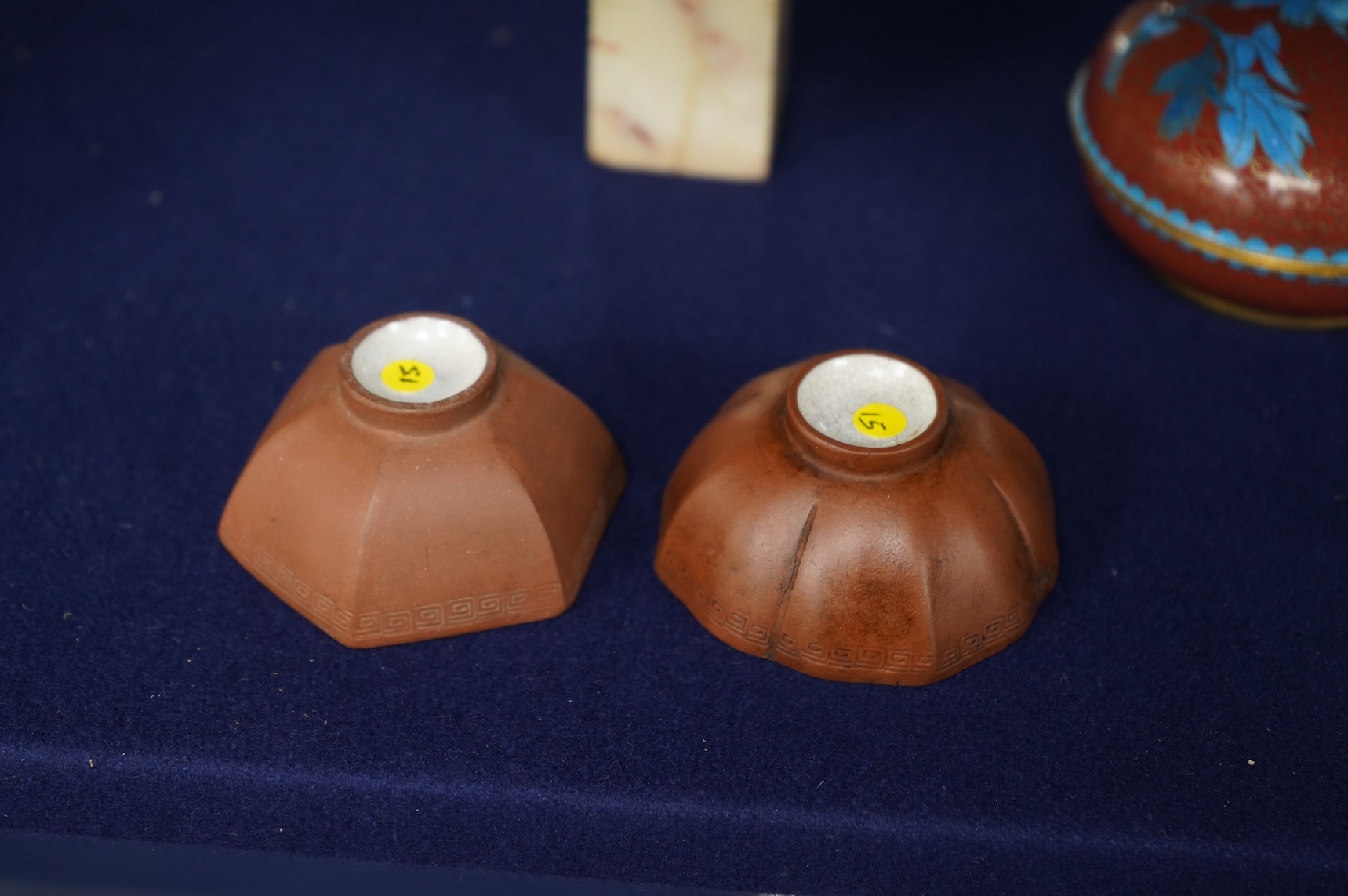Two 18th century Yixing cups, a Chinese soapstone seal and two covered cloisonne pots, seal 11cm high